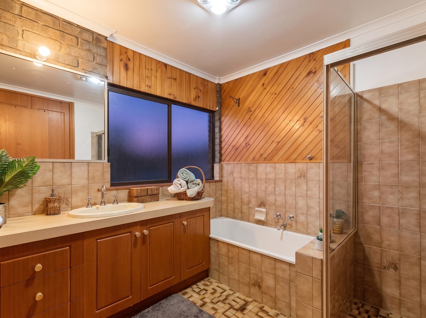Family bathroom with bath and shower