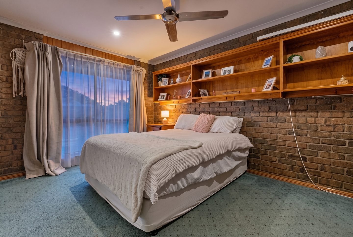 Bedroom with built-in shelving